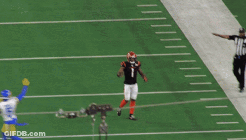 A Football Player With The Number 1 On His Jersey Catches A Ball GIF