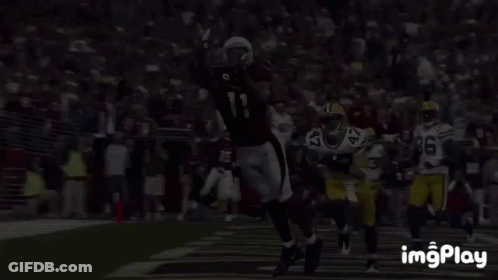 A Football Player With The Number 1 On His Jersey Is Catching The Ball GIF