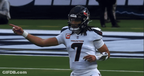 A Football Player With The Number 1 On His Jersey Is Pointing GIF