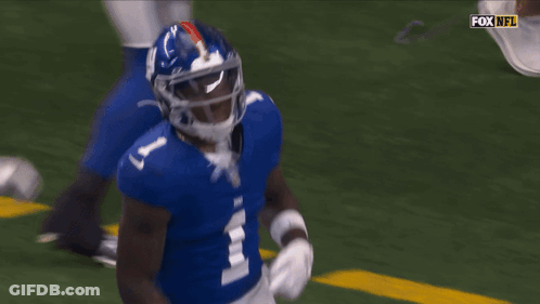 A Football Player With The Number 1 On His Jersey Is Running On The Field GIF