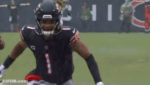 A Football Player With The Number 1 On His Jersey Is Running On The Field GIF