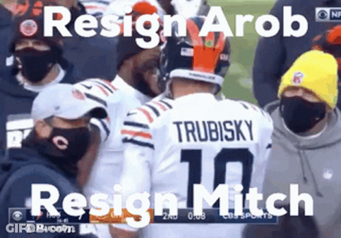 A Football Player With The Number 10 On His Back Talks To Another Player GIF