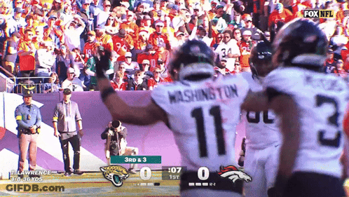 A Football Player With The Number 11 On His Back GIF