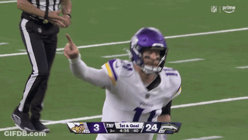 A Football Player With The Number 11 On His Jersey Is Giving A Thumbs Up GIF