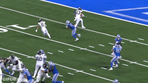 A Football Player With The Number 11 On The Back Of His Shirt GIF