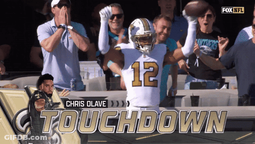 A Football Player With The Number 12 On His Jersey Celebrates GIF