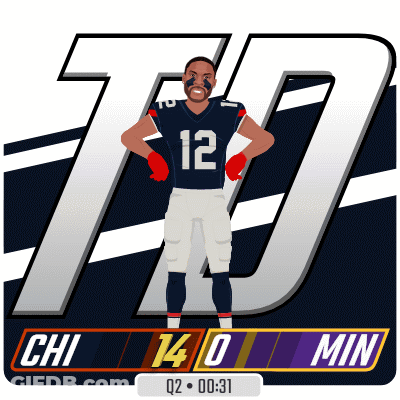 A Football Player With The Number 12 On His Jersey Is Standing With His Hands On His Hips GIF