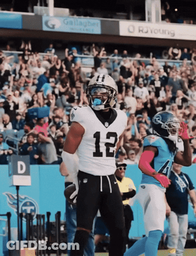 A Football Player With The Number 12 On His Shirt GIF
