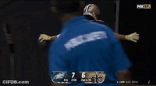 A Football Player With The Number 12 On The Back Of His Shirt GIF