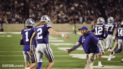 A Football Player With The Number 12 On Their Jersey GIF