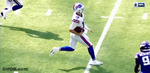 A Football Player With The Number 13 On His Jersey Runs With The Ball GIF
