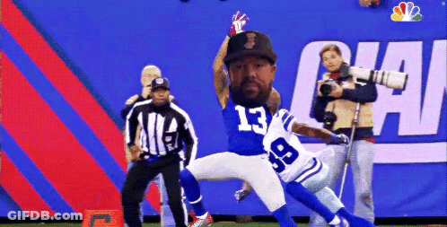 A Football Player With The Number 13 On His Shirt GIF