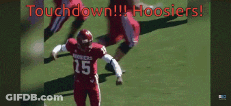 A Football Player With The Number 15 On His Jersey Is On The Field GIF