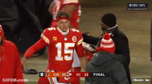 A Football Player With The Number 15 On His Jersey Stands On The Field GIF