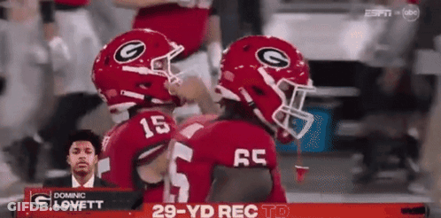 A Football Player With The Number 15 On Their Helmet GIF