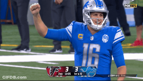 A Football Player With The Number 16 On His Jersey Celebrates On The Field GIF