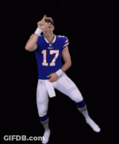 A Football Player With The Number 17 On His Jersey Dancing GIF