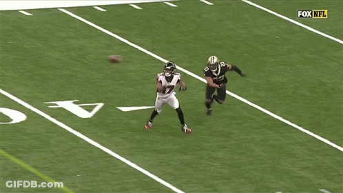 A Football Player With The Number 17 On His Jersey Is Playing On The Field GIF