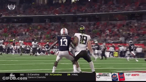 A Football Player With The Number 18 On His Back GIF