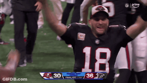 A Football Player With The Number 18 On His Shirt GIF