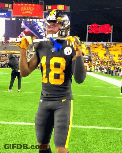 A Football Player With The Number 18 On His Shirt GIF