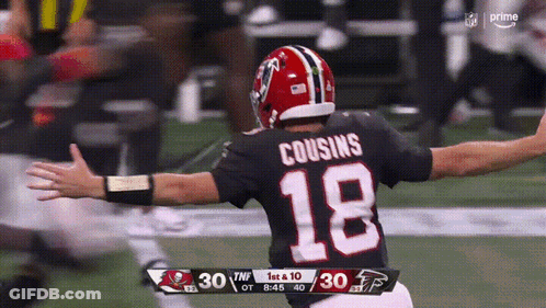 A Football Player With The Number 18 On The Back Of His Shirt GIF