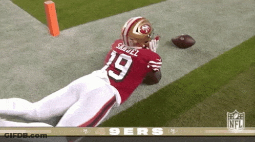 A Football Player With The Number 19 On His Back GIF