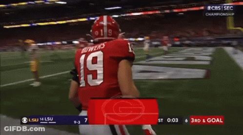A Football Player With The Number 19 On His Jersey Is Running On The Field GIF