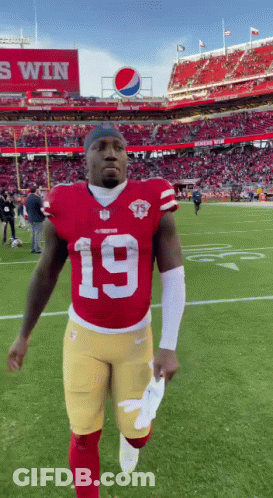 A Football Player With The Number 19 On His Shirt GIF