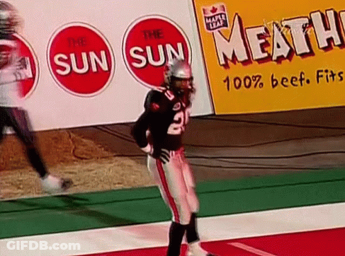A Football Player With The Number 2 On His Jersey Is Standing On The Field GIF
