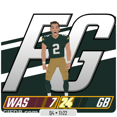 A Football Player With The Number 2 On His Jersey Stands In Front Of A Large Fg Logo GIF