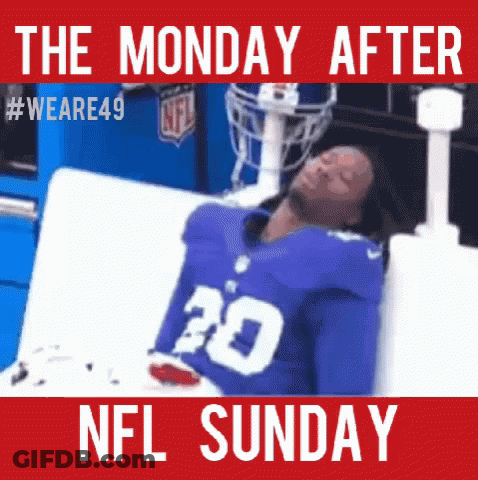 A Football Player With The Number 20 On His Jersey Is Laying In A Bed . GIF