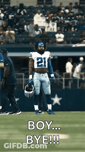 A Football Player With The Number 21 On His Jersey Is Standing On The Field GIF