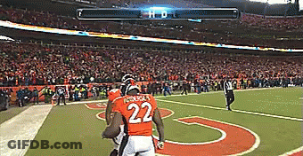 A Football Player With The Number 22 On His Jersey Runs On The Field GIF
