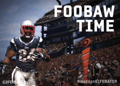 A Football Player With The Number 24 On His Jersey Is Running With A Ball GIF