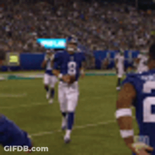 A Football Player With The Number 26 On His Back Is Running On The Field GIF