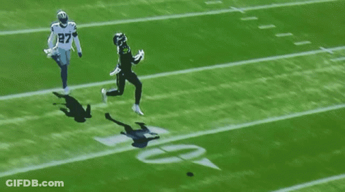 A Football Player With The Number 27 On Their Jersey GIF
