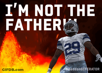 A Football Player With The Number 29 On His Jersey Is Standing In Front Of A Fire GIF