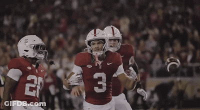 A Football Player With The Number 3 On His Jersey Is Being Hugged By Another Player GIF