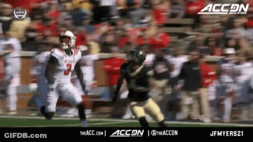 A Football Player With The Number 3 On His Jersey Is Being Tackled By Another Player GIF