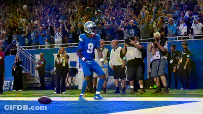 A Football Player With The Number 3 On His Jersey Is Celebrating A Touchdown . GIF