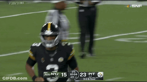 A Football Player With The Number 3 On His Jersey Runs On The Field GIF