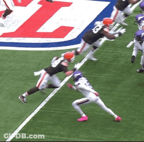 A Football Player With The Number 3 On The Back Of His Helmet GIF