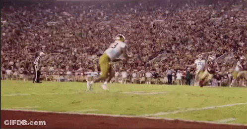 A Football Player With The Number 3 On The Back Of His Jersey GIF