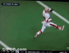 A Football Player With The Number 31 On His Jersey Is Running On The Field GIF