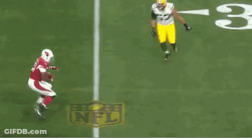 A Football Player With The Number 31 On His Jersey Is Running On The Field GIF