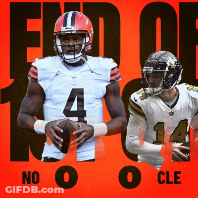 A Football Player With The Number 4 On His Jersey Is Holding A Ball GIF