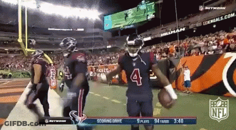 A Football Player With The Number 4 On His Jersey Is Running On The Field GIF