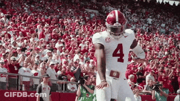 A Football Player With The Number 4 On His Uniform GIF