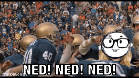 A Football Player With The Number 40 On His Jersey Is Surrounded By Other Players GIF